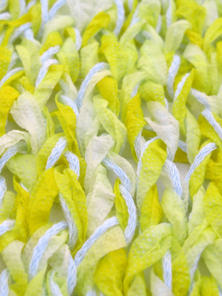 Dot knits sunshine scarf sample close-up yellow recycled paper yarn